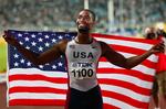 Tyson Gay fanget af fotografen efter sin sejr på 100 meter i mandags. 