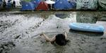 Regnen på festivalgæsterne slog alle rekorder. Men det dårlige vejr har ikke ramt festivalen på pengepungen. 