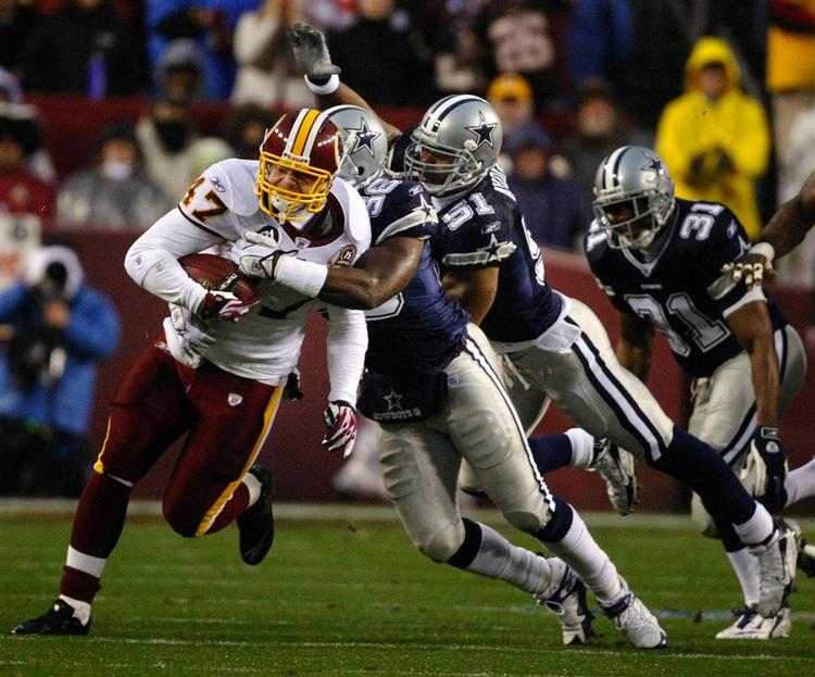Washington Redskins Chris Cooley tackles i kampen mod Dallas Cowboys. 