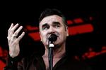 Charmesmilet er fundet frem hos Morrissey, her på Roskilde i 2006. Til sommer vil han gerne spille i Iran. 