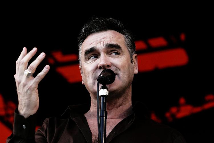 Charmesmilet er fundet frem hos Morrissey, her på Roskilde i 2006. Til sommer vil han gerne spille i Iran. 