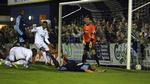 Havant &amp; Waterlooville kom foran 1-0, da Garry Monk (liggende) hårdt presset af Richard Pacquette headede i eget net. 
