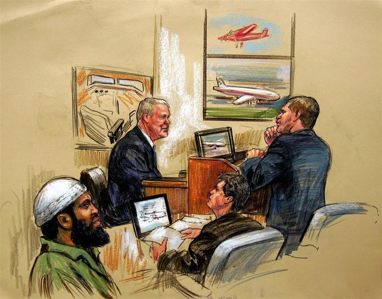 Clarens Prevost forhøres i retten i Alexandria, Virginia af advokat David Novak, mens Zacarias Moussaoui lytter på. 