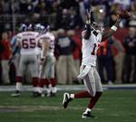 Matchvinderen, New York Giants- receiveren Plaxico Burress jubler. 