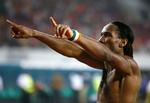 Drogba jubler efter den sikre kvartfinalesejr. 