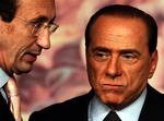 Italien oppositionsleder, Berlusconi, vil have valg nu. 
