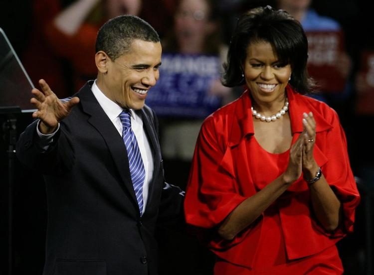 Barack Obama og hustruen Michelle forud for hans tale til tilhængerne i Illinois. 