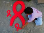 Aids er så stor og verdensomspændende sygdom, at WHO har valgt 1. december som årlig aids-dag. Her bliver det markeret i 2006 i Filippinerne. 