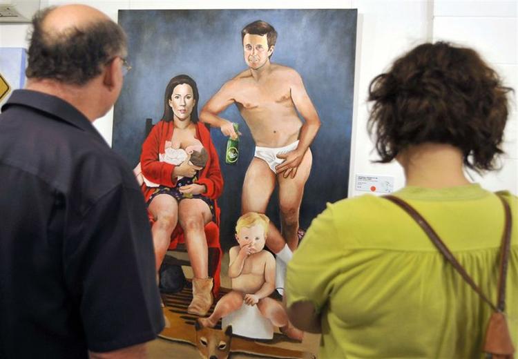 James Brennan i  Australien har vundet Bald Archy Prize for sin alternative fremstilling af kronprinsparret og deres to børn. 