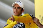 Alberto Contador får ikke mulighed for at gentage sidste års triumf i Tour de France. Hans nye hold, Astana, er nemlig uønsket ved verdens største cykelløb. 