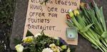 Christianitterne har lagt blomster på det sted, hvor en hund i går blev skudt af en politibetjent under anholdelse af en hashsælger. 