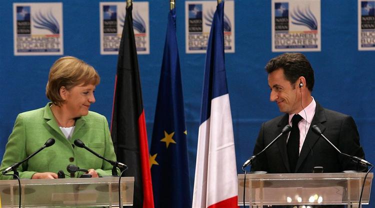 Det nye stærke makkerpar i Nato, tyske Merkel og franske Sarkozy. 
