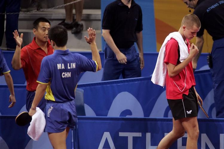 Både i VM-semifinalen i 2005 i single og OL-semifinalen i 2004 (billedet) i double har Michael Maze tabt til Ma Lin. 