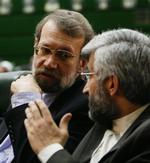 Ali Larijani ses her til venstre. Irans topforhandler i atomspørgsmål er nu valgt til parlamentsformand. Arkivfoto. 