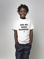 Marc Johannes Schmidt. otte år og født på Haiti. Kom til Danmark i 2003. 
