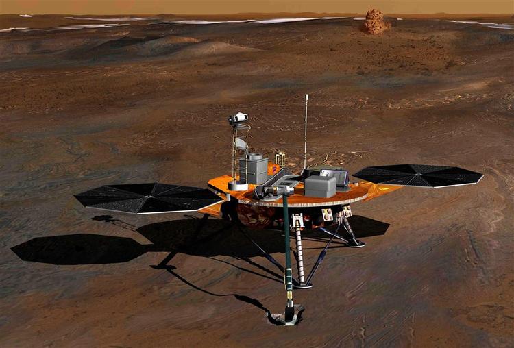 Et modelbillede af Phoenix, der lige nu slås med klumper i Mars' jord. 