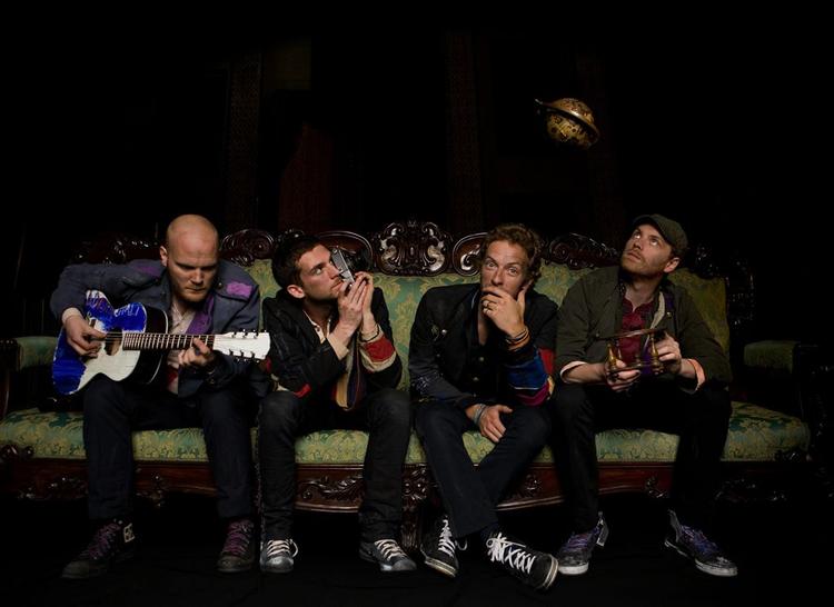 Chris Martin (nummer to fra højre) beskyldes for at have planket nummeret 'Viva la Vida' fra et ukendt band fra Brooklyn, New York. 