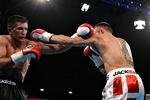 Dimitri Sartison tabte de første 11 omgange mod Mikkel Kessler (th.), og i 12. omgang blev han så knockoutet og båret fra ringen. 