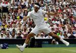 Roger Federer fejede Lleyton Hewitt af banen i Wimbledon. 