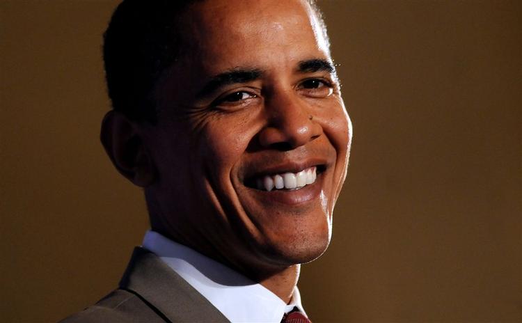 Obama har grund til at smile, nu han har Bill Clintons støtte. 