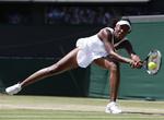 Venus Williams returnerer en bold fra Tamarine Tanasugarn i dagen kvartfinale. 
