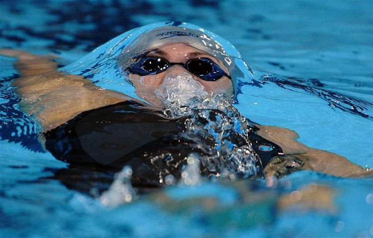 Natalie Coughlin har sat to af de seks verdensrekorder i Omaha. I 100 meter rygcrawl med 59,03 sek. i indledende heat og dernæst i finalen med 58,97 sek. 