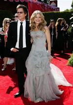 Kevin Bacon ankommer med sin hustru Kyra Sedgwick til Emmy Awards-uddeling i 2006. 