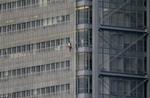 I juni klatrede denne mand op på toppen af Times Building, hvor han blev anholdt. 