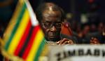 Zimbabwes leder Mugabe glæder sig over, at FN's Sikkherdsråd ikke kunne blive enige om at indføre sanktioner mod Zimbabew. - Arkivfoto. 