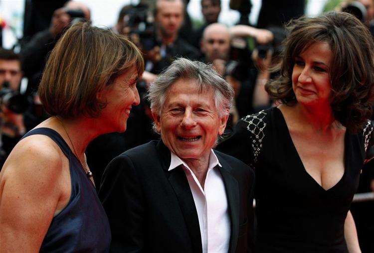 Roman Polanski på den røde løber i Cannes. Han håber at kunne frikendes for en gammel dom, der i 30 år har holdt ham uden for USA's grænser. 