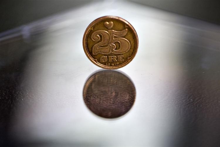 I alt er der 125 millioner kroner i omløb af den lille rødbrune kobber 25-øre. 