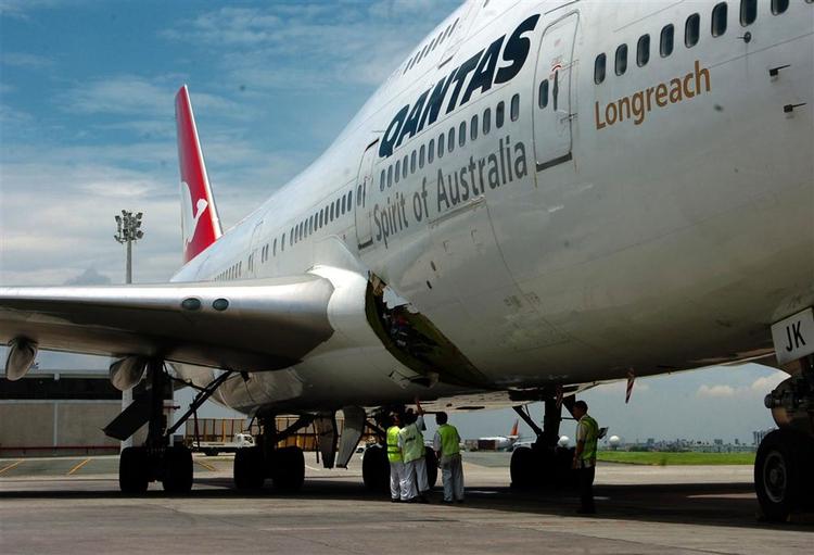Det australske passagerfly af typen Boeing 747-400 i Manilas lufthavn. 
