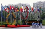 Indgangen til den olympiske by i Beijing i dag. En af de danske OL-deltagere må nøjes med at se den på billedet, da vedkommende er blevet taget for doping. 