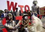 Indonesiske aktivister protesterer mod forløbet i WTO-forhandlingerne i sidste uge. Forhandlingerne varede i ni dage. 