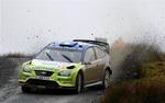 Finlands Mikko Hirvonen giver den gas i sidste års VM-rally i Wales. I år skulle løbet blive CO2-neutralt. 