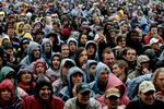 Helt så vådt som sidste års Roskilde Festival vil det næppe blive. Men afhængigt af vindforholdene kan der falde rigtigt meget regn natten til fredag. Arkivfoto: Peter Hove Olesen. 