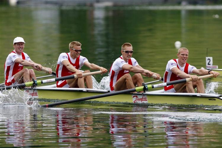 Den danske guldfirer under World Cup i Schweiz 1. juni. Letvægtsroerne tror på, at de høster tre guldmedaljer under OL. Arkivfoto. 