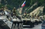 Rusland har sendt yderligere 10.000 soldater til Sydossetien. Det har fået georgierne til at trække sig tilbage. 