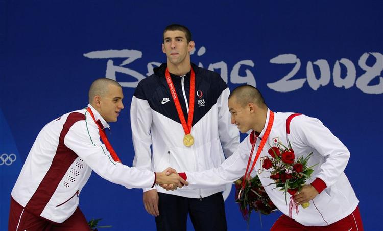 Michael Phelps troner ikke blot over medaljevinderne Laszlo Cseh fra Ungarn (tv.) og japaneren Takeshi Matsuda i 200 meter butterfly, men over alle andre guldvindere i den olympiske historie. 