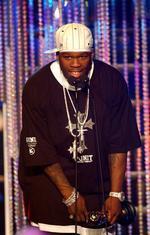 Rapperen 50 Cent debuterede med albummet 'Get Rich or Die Tryin'i 2003. Albummet blev produceret af Eminem og Dr. Dre. På billedet ses 50 Cent ved en prisuddeling i Monaco. Arkivfoto. 