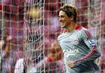 Liverpools målmager Fernando Torres jubler efter den afgørende scoring mod Sunderland. 