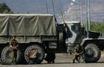 Russiske ved et checkpoint i udkanten af Gori, nordvest for Georgiens hovedstad i dag. Gori ligger på Georgiens eneste hovedvej fra øst-vest, og det betyder, at de russiske styrker effektivt kan dele landet i to, hvis de sidder på den. 