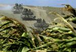 Russiske kampvogne forlader stillinger ved Kruisi vest for Gori i Georgien. Men der er foreløbig tale om troppeomrokeringer. 