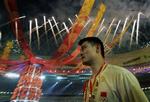 Kinas basketstjerne Yao Ming under den farvestrålende afskedsceremoni i Beijing. 