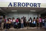 Flere flyafgange blev aflyst i lufthavnen i Port-au-Prince,da orkanen Gustav nærmede sig Haiti. 