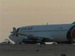 Det kaprede, sudanesiske Sun Air-fly ved den libyske oaseby. 