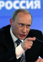 Ruslands premierminister Vladimir Putin, langer ud efter USA og George W. Bush. 