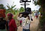Den tropiske orkan Gustav ramte torsdag Haiti. Indbyggere forsøgte at bringe sig selv og deres ejendele i sikkerhed. Indtil videre har orkanen  kostet 68 menneskeliv i Caribien. 