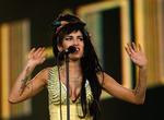 Amy Winehouse optræder i udkanten af Madrid 4. juli. Arkivfoto. 