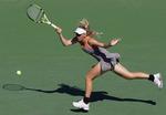 Caroline Wozniacki røg ud i fjerde runde af US Open efter at have tabt i tre sæt 3-6, 6-2, 6-1 til verdens næstbedste spiller, serberen Jelena Jankovic. 